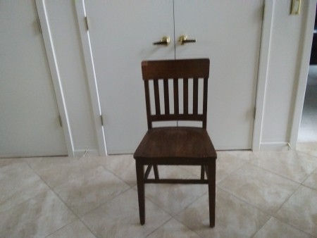 Value of a Murphy Chair - dark wood chair with slat back and no arms