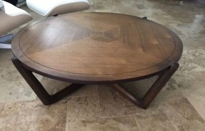 Value of a Bassett Coffee Table - round table divided into quadrants  with the veneer sections creating concentric squares