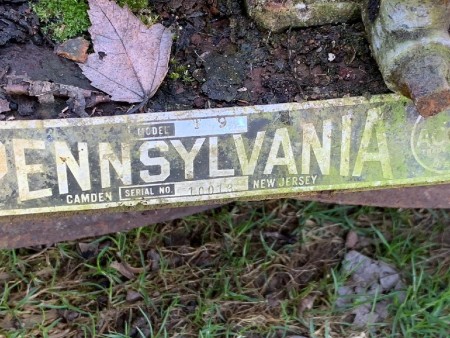 The sign on a vintage Pennsylvania reel mower.