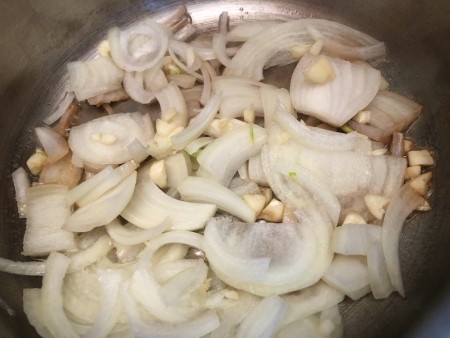 onions & mushrooms in pan