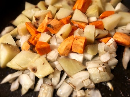 onions & potatoes in pan