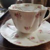Identifying a Mustache Tea Cup and Saucer  - white cup and saucer with pink rose pattern, it has a mustache guard