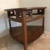 Value of a Mersman Table - medium wood color triangular, corner table with lower shelf