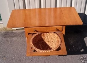 Value of a Conant Ball Drop Leaf Table - small table with pull out shelf with a basket