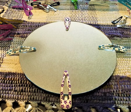 Fun Mirror with Barrettes - place one clip at 12, 3, 6 and 9