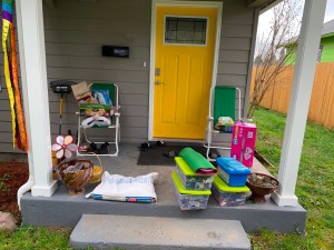 Groceries and supplies dropped off on the porch.