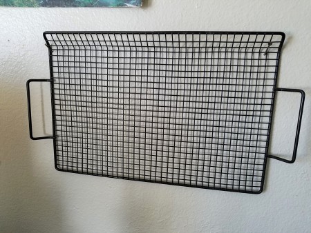 Hanging Necklaces Using Re-purposed Items - black tray with bent edge facing out