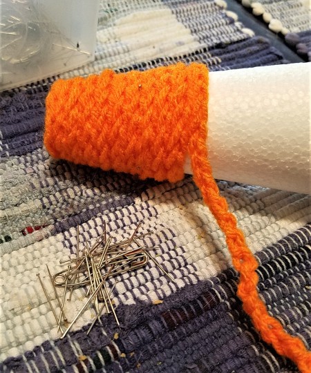 Crocheted Carrot - wrap and continue pinning in place