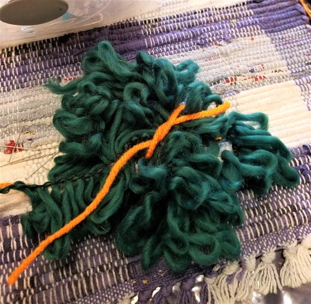 Crocheted Carrot - tying the wrapped yarn for the top