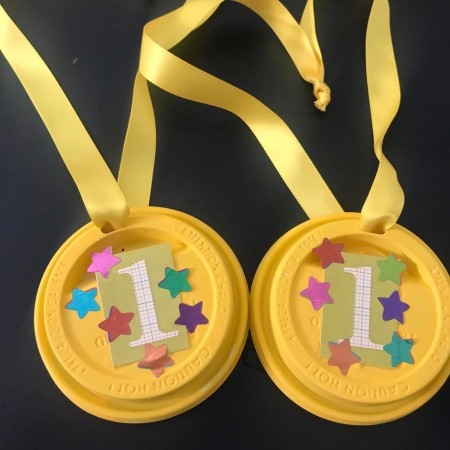 Kids' Award Medals - cut ribbon and thread through the hole and knot