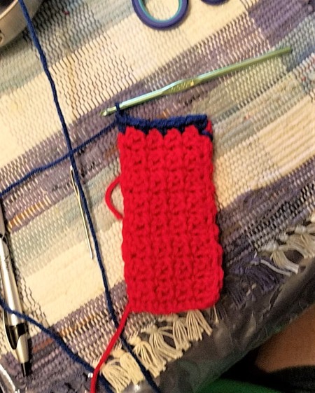 Blue Flew and the Bottle Top Kids!! - blue yarn added, 16 more rows