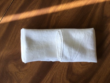 Washable No-Sew Mask - fold sides to center and fit one end into the other