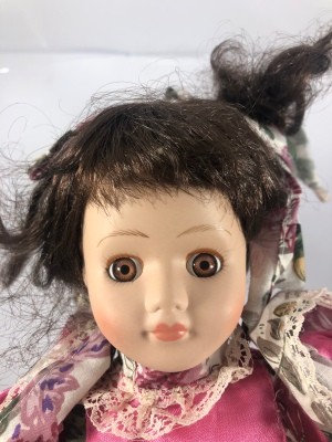 Identifying a Porcelain Doll - well played with doll