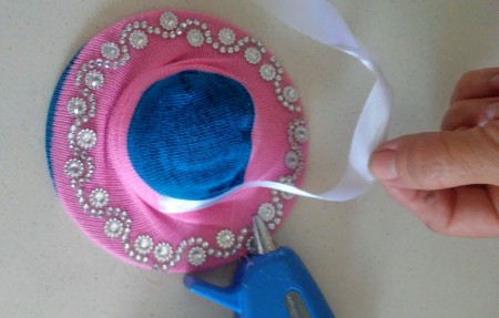 Upcycled Mini Easter Hat - hot glue on the ribbon around the crown