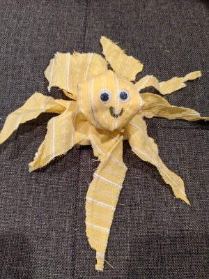 Making a Fabric Octopus - yellow and white striped octopus on grey background