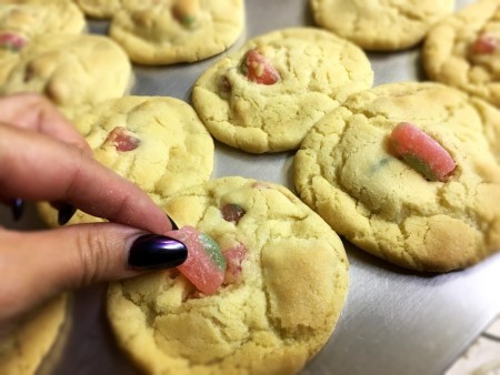 adding Sour Gummies to top of  Sugar Cookies