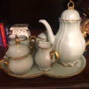 Identifying a Bavarian China Tea Service - a pale blue china tea set with gold trim.