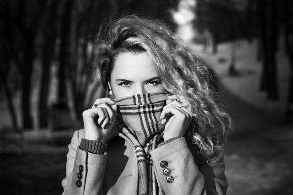 Scarf being used as a face mask.