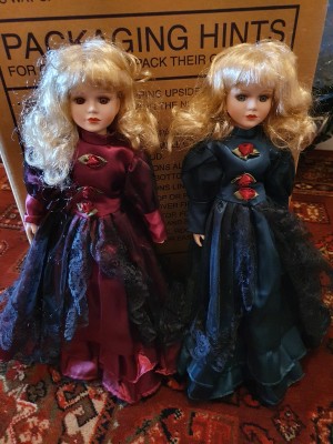 Identifying Porcelain Dolls - two blonde dolls wearing dark blue long dresses