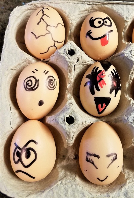 Faux Egg Faces - closeup including one with crack lines drawn on it