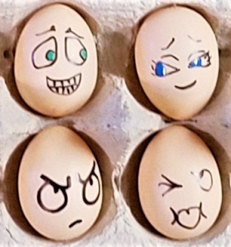 Faux Egg Faces - closeup of flirting eggs and gassy egg