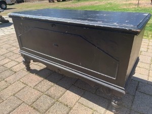 Value of a Lane Cedar Chest - chest with turned legs, painted black