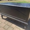 Value of a Lane Cedar Chest - chest with turned legs, painted black
