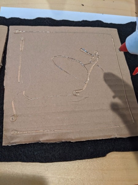 Inexpensive Felt Message Board - glue the second piece of cardboard to the first