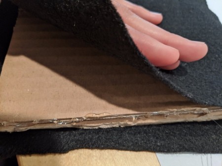 Inexpensive Felt Message Board - wrap the layers of cardboard with the felt