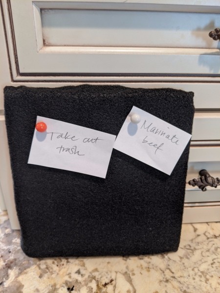 Inexpensive Felt Message Board - felt board with notes on countertop