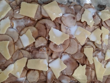 milk added to potatoes & cheese