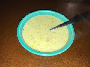 A bowl of creamy blue cheese celery soup.