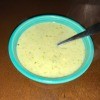 A bowl of creamy blue cheese celery soup.