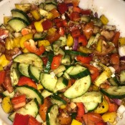 A bowl of Greek salad, ready for serving.