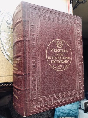 Value of a 1924 Webster's New International Dictionary  - red leather bound dictionary
