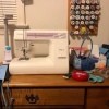 Janome Sewing Machine Making a Buzzing Sound - sewing machine on a desk top