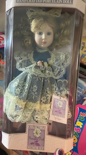 Value of a Collectible Memories Porcelain Doll - doll in the box
