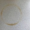 Removing a Burn Mark on a Formica Countertop - brown circular burn mark on a light countertop