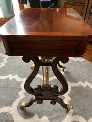Value of a Vintage Lyre Game Table - game table with two lyre end legs/supports and brass covered wheeled feet