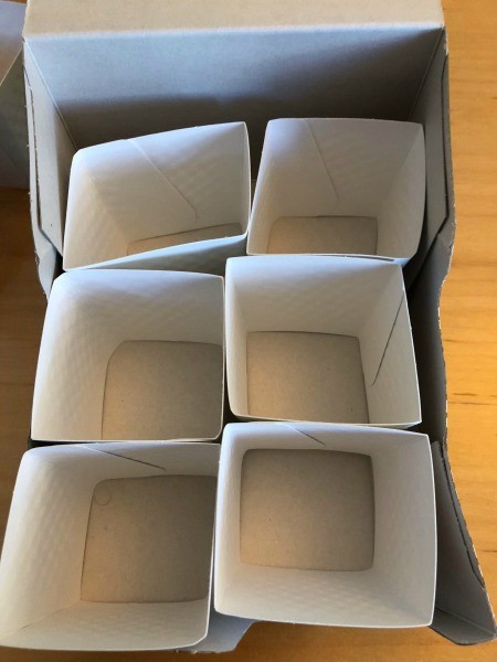 DIY Hot Cup Sleeve Tea Organizer - square sleeves loose in the box