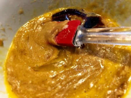 adding eggs to batter