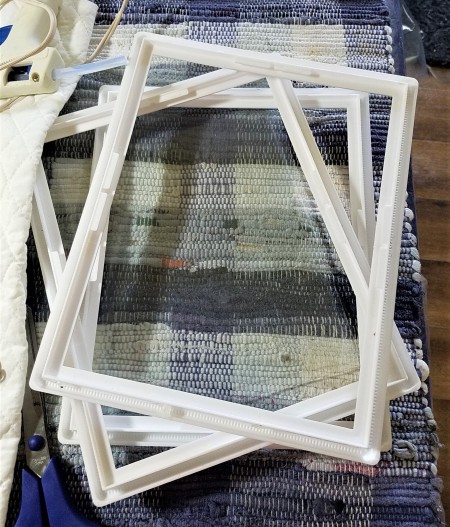 Protecting and Displaying Your Collection - three white plastic frames