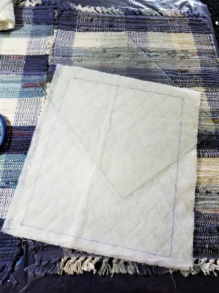 Protecting and Displaying Your Collection - quilted fabric and pane of glass