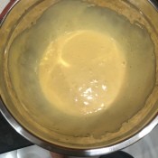 Making Hollandaise Sauce - pan of sauce