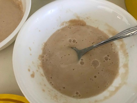 mixing yeast & water in bowl