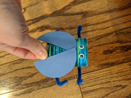 Recycled Paper Tube Bug Toy - eyes, legs, and wings attached