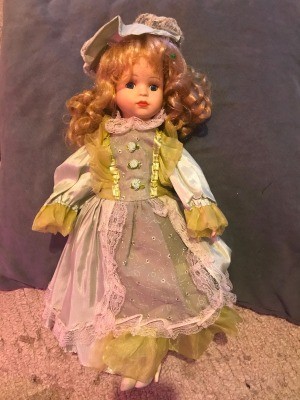 Identifying a Porcelain Doll - doll in long dress and hat