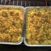 Macaroni and cheese in foil containers.