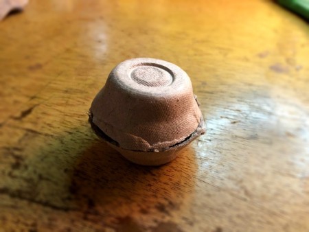 Egg Carton Panda - glue two of the bowls together as shown to make the body