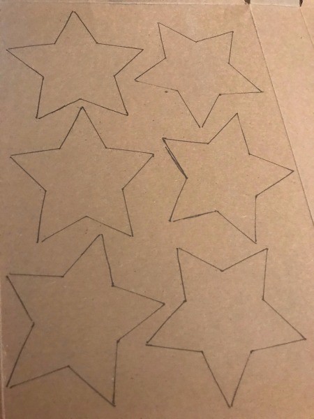 Recycled Paper Memorial Day Wreath - stars traced on cardboard